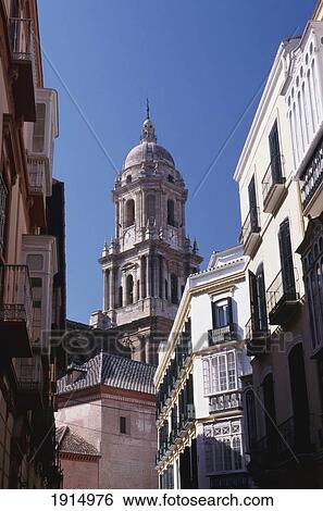 Stock Photograph - Cathedral Above Roof Tops. Fotosearch