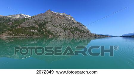 Stock Photo - Cathedral Mountain Reflected Into Atlin Lake, Atlin Provincial Park, Canada. Fotosearch