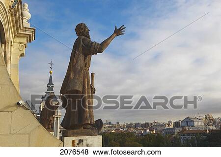 Cathedral Of Our Lady Of Almudena With Statue Of Apostle On Base Of Dome By Luis A. Sanguino; Madrid Spain View Large Photo Image Stock Photo - Cathedral Of Our Lady Of Almudena With Statue Of Apostle On Base Of Dome By Luis A. Sanguino; Madrid Spain. Fotosearch