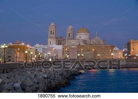 Stock Photography - Cathedral On Waterfront At Dusk. Fotosearch