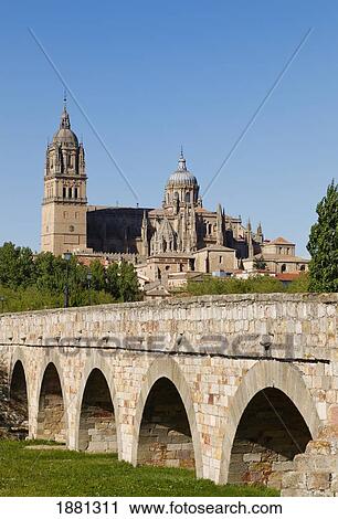 Cathedral Seen Beyond Roman Bridge Over Tormes River; Salamanca, Salamanca Province, Spain View Large Photo Image Stock Image - Cathedral Seen Beyond Roman Bridge Over Tormes River; Salamanca, Salamanca Province, Spain. Fotosearch