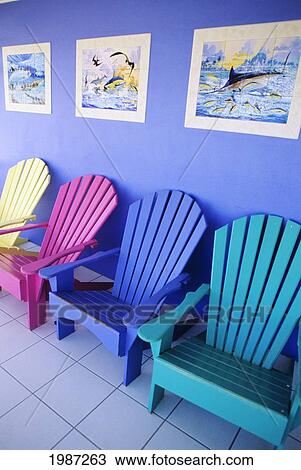 Cayman Islands, Grand Cayman, Colorful Wooden Chairs And Artwork On Storefront. View Large Photo Image Stock Image - Cayman Islands, Grand Cayman, Colorful Wooden Chairs And Artwork On Storefront.. Fotosearch