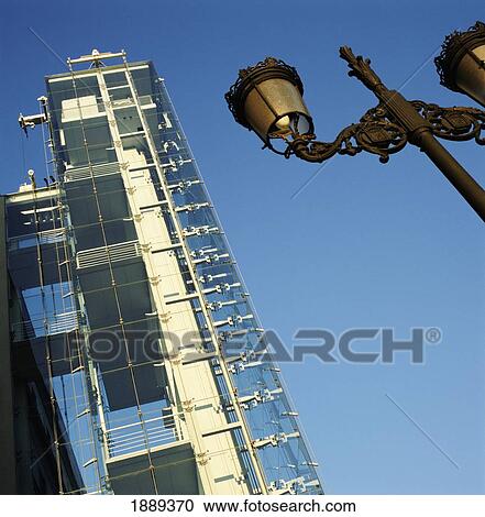 Stock Image - Centro De Arte Reina Sofia And Lamp Post. Fotosearch