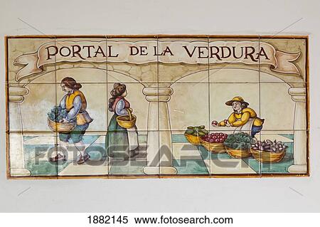 Stock Photography - Ceramic Tile Painting Of 17Th Or 18Th Century Vegetable Seller's Stall In The Plaza Mayor; Trujillo, Caceres Province, Spain. Fotosearch