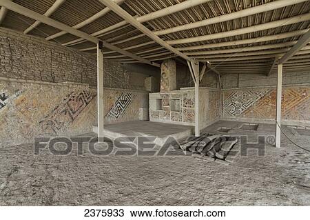Stock Image - Ceremonial precinct decorated with polychrome Moche friezes where the Royal Tomb of the Lady of Cao and her escorts was found at Huaca Cao Viejo (or Huaca Blanca) at El Brujo Archaeological Complex, La Libertad, Peru. Fotosearch