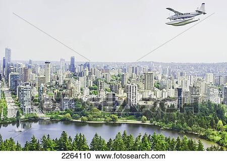 Cessna Caravan Amphibian Seaplane On Approach To The Vancouver Harbour Water Airport; Vancouver British Columbia Canada View Large Photo Image Stock Image - Cessna Caravan Amphibian Seaplane On Approach To The Vancouver Harbour Water Airport; Vancouver British Columbia Canada. Fotosearch