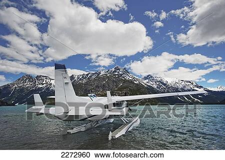 Cessna caravan amphibian seaplane afloat on chilko lake by ts'yl-os provincial park; british columbia canada View Large Photo Image Stock Image - Cessna caravan amphibian seaplane afloat on chilko lake by ts'yl-os provincial park; british columbia canada. Fotosearch