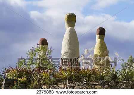 Stock Image - Chachapoya-style statues at the entrance of the Leymebamba Museum, Leymebamba, Amazonas, Peru. Fotosearch
