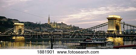 Stock Image - Chain Bridge, River Danube And Matyas Church At Dusk. Fotosearch