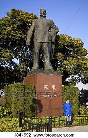 Stock Image - Chairman Mao Statue On The Bund; Shanghai, China. Fotosearch