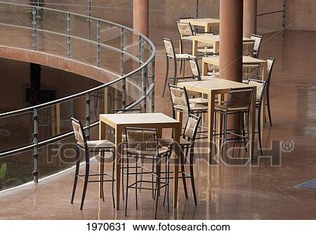 Stock Image - Chairs And Tables In The Reception Area Of The Paranal Residencia At The European Southern Observatory, Antofagasta Region, Chile. Fotosearch