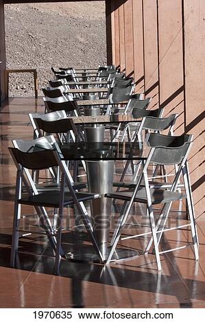 Stock Photography - Chairs On The Terrace Of The Canteen Area Of The Paranal Residencia At The European Southern Observatory, Antofagasta Region, Chile. Fotosearch