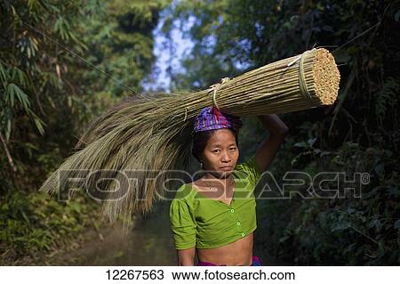Chakma woman carrying bundle on way to market; Khagrachari, Chittagong Division, Bangladesh View Large Photo Image Stock Image - Chakma woman carrying bundle on way to market; Khagrachari, Chittagong Division, Bangladesh. Fotosearch