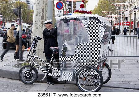 Stock Photo - Champs Elysees character; Paris, France. Fotosearch