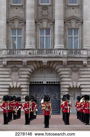 Stock Photograph - Changing of the guard, Buckingham Palace; London, England. Fotosearch