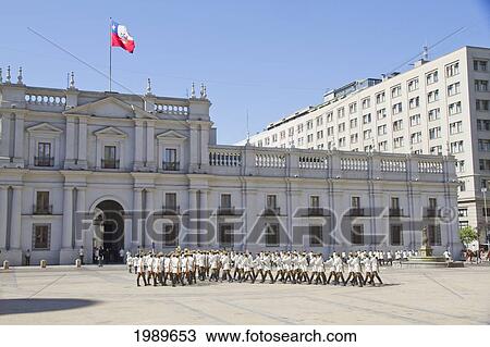 Changing of the guards by Carabineros on Plaza de la Constitucion in front of the Palacio de la Moneda Presidential Palace, Santiago, Metropolitan Region, Chile View Large Photo Image Stock Image - Changing of the guards by Carabineros on Plaza de la Constitucion in front of the Palacio de la Moneda Presidential Palace, Santiago, Metropolitan Region, Chile. Fotosearch