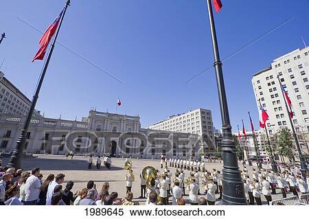 Changing of the guards by Carabineros on Plaza de la Constitucion in front of the Palacio de la Moneda Presidential Palace, Santiago, Metropolitan Region, Chile View Large Photo Image Stock Photography - Changing of the guards by Carabineros on Plaza de la Constitucion in front of the Palacio de la Moneda Presidential Palace, Santiago, Metropolitan Region, Chile. Fotosearch