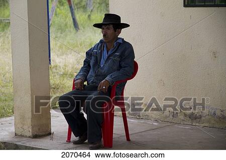 Picture - Chapaco Sitting On A Chair At The Festivities Of The D. Fotosearch