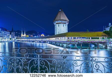Stock Photograph - Chapel bridge and Lake Lucerne; Lucerne, Switzerland. Fotosearch