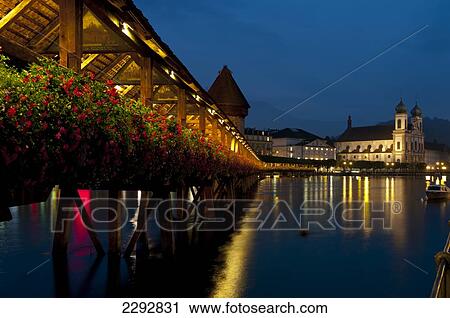 Stock Image - Chapel Bridge Dusk, Lucerne, Switzerland. Fotosearch