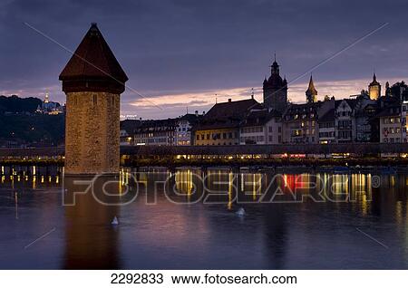 Stock Image - Chapel Bridge Dusk, Lucerne, Switzerland. Fotosearch