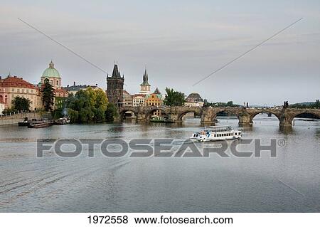 Stock Photo - Charles Bridge Over The Vltava River At Dusk, Prague, Czech Republic. Fotosearch