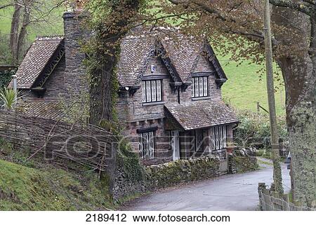Stock Image - Charming House Along The South West Coast Path Near Lynmouth, Exmoor, United Kingdom. Fotosearch