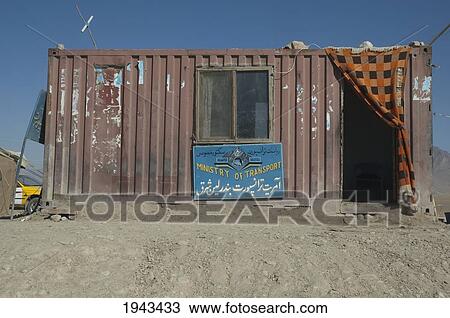Stock Image - Checkpoint Of The Ministry Of Transport Housed In A Container In The Outskirts Of Kabul,, Afghanistan. Fotosearch