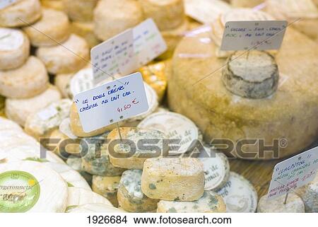 Picture - Cheeses For Sale In Shop Window, Paris, France. Fotosearch