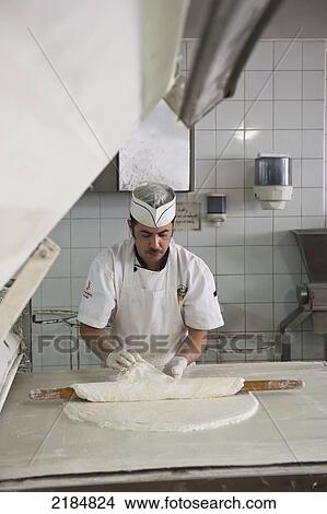 Picture - Chef Preparing Traditional Arabic Sweets, Mediterranean Sweets Or Middle Eastern Sweets Made At The Zalatimo Sweetshop, Amman, Jordan, Middle East. Fotosearch