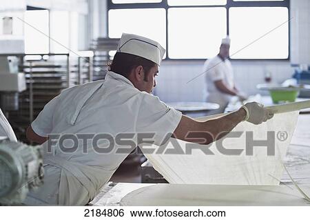 Stock Photograph - Chef Preparing Traditional Arabic Sweets, Mediterranean Sweets Or Middle Eastern Sweets Made At The Zalatimo Sweetshop, Amman, Jordan, Middle East. Fotosearch