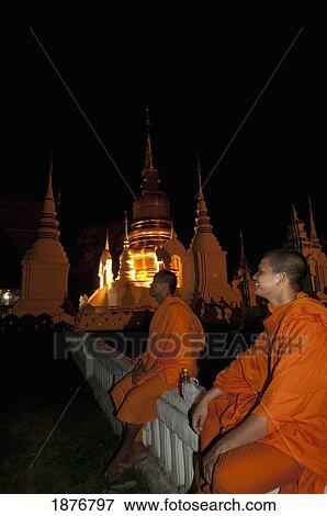 Stock Photo - Chiang Mai, Thailand; Monks At The Wat Suan Dok Temple. Fotosearch