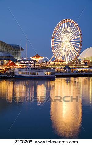 Chicago, Illinois Boat Leaving Navy Pier At Night, Ferris Wheel, Lights Reflected In Water Of Lake Michigan View Large Photo Image Stock Photography - Chicago, Illinois Boat Leaving Navy Pier At Night, Ferris Wheel, Lights Reflected In Water Of Lake Michigan. Fotosearch