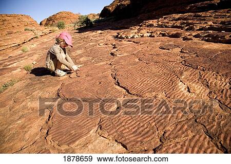 Child Looking At Patterns On Sandstone In Kings Canyon View Large Photo Image Stock Photo - Child Looking At Patterns On Sandstone In Kings Canyon. Fotosearch