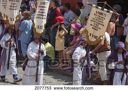 Stock Image - Children Carrying Standards At The Procession Of The Holy Cross On Good Friday In Antigua Guatemala, Sacatep. Fotosearch