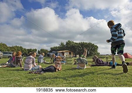 Children Having Fun On A Camping Holiday, Pevensey Bay, East Sussex, England, United Kingdom View Large Photo Image Stock Photography - Children Having Fun On A Camping Holiday, Pevensey Bay, East Sussex, England, United Kingdom. Fotosearch