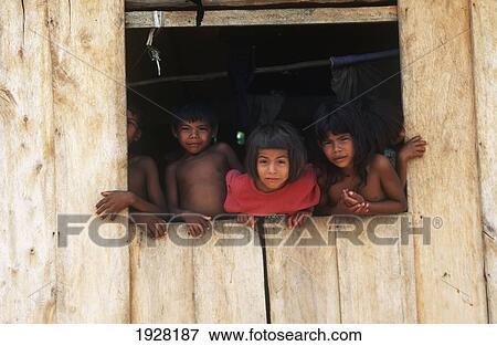 Stock Photo - Children In Window. Fotosearch