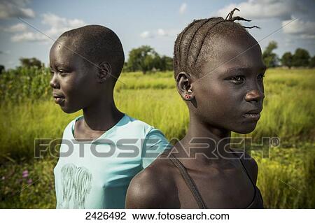 Stock Image - Children of the Nuer tribe, close to Gambella in Western Ethiopia; Ethiopia. Fotosearch