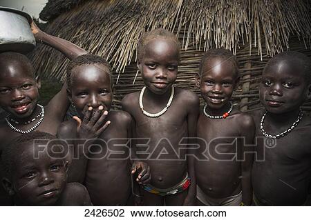 Stock Image - Children of the Nuer tribe, close to Gambella in Western Ethiopia; Ethiopia. Fotosearch