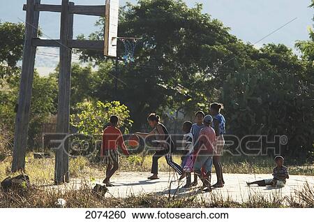 Stock Image - Children Playing Basketball In Ranohira, Fianarantsoa Province, Madagascar. Fotosearch