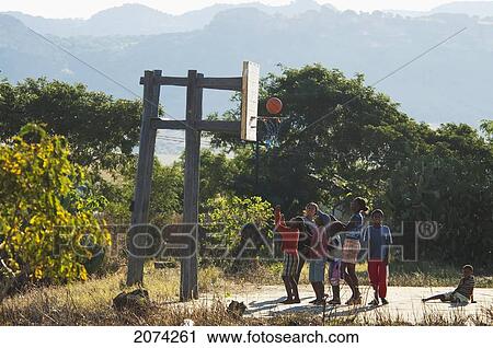 Stock Image - Children Playing Basketball In Ranohira, Fianarantsoa Province, Madagascar. Fotosearch