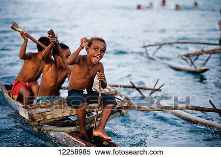 Children playing in canoes on Blackwater Lakes; Sepik River, Papua New Guinea View Large Photo Image Stock Photography - Children playing in canoes on Blackwater Lakes; Sepik River, Papua New Guinea. Fotosearch