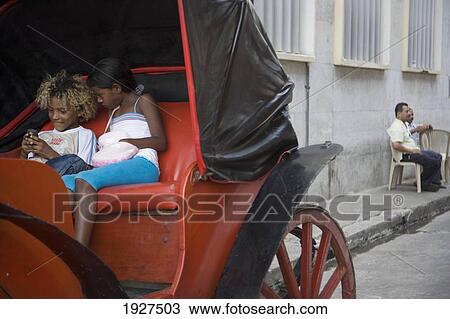 Stock Image - Children Sitting In Tourist Cart. Fotosearch