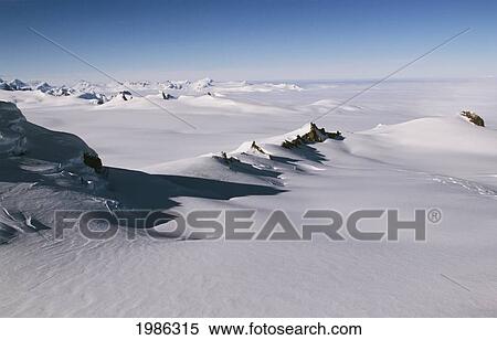 Stock Photography - Chile, Aerial view of snowy mountain ranges; Andes Cordillera. Fotosearch