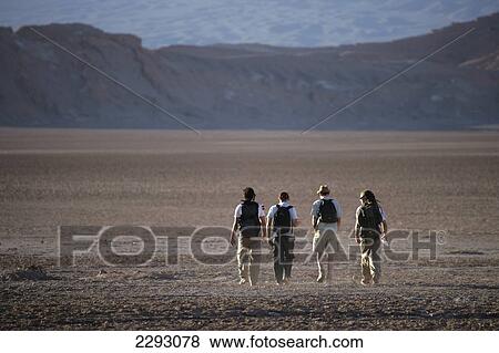 Stock Photo - Chile, People hiking in Valle de la Luna; San Pedro de Atacama. Fotosearch