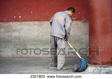 China, Beijing, Forbidden City, Man mopping concrete floors around red pillar View Large Photo Image Stock Image - China, Beijing, Forbidden City, Man mopping concrete floors around red pillar. Fotosearch