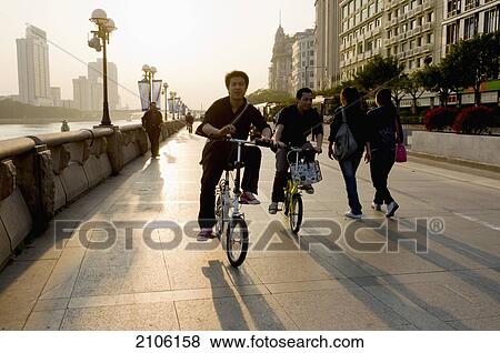 Stock Photo - China, Guangdong, Riverfront promenade; Guangzhou. Fotosearch