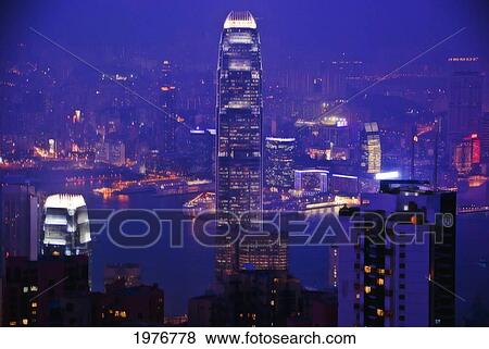 China, Hong Kong, Image With Both Kowloon And Hong Kong Skylines At Dusk With New Mtr Building Towering; Kowloon View Large Photo Image Stock Photo - China, Hong Kong, Image With Both Kowloon And Hong Kong Skylines At Dusk With New Mtr Building Towering; Kowloon. Fotosearch
