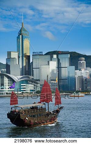 China, Hong Kong Island, converted for tourists rides around harbor; Victoria Harbor, Traditional Chinese Junk boat View Large Photo Image Stock Photograph - China, Hong Kong Island, converted for tourists rides around harbor; Victoria Harbor, Traditional Chinese Junk boat. Fotosearch