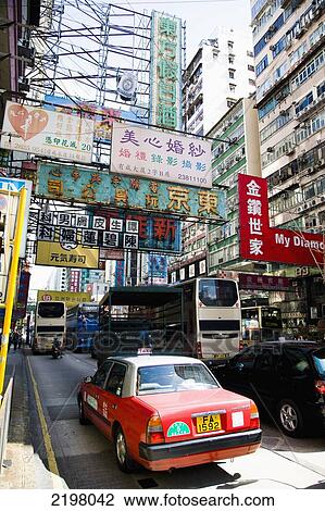 China, Hong Kong, Streets bustle with taxis and busses; Kowloon View Large Photo Image Stock Image - China, Hong Kong, Streets bustle with taxis and busses; Kowloon. Fotosearch